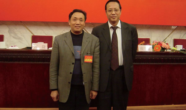 与原农业部副部长、中国畜牧业协会会长张宝文合影